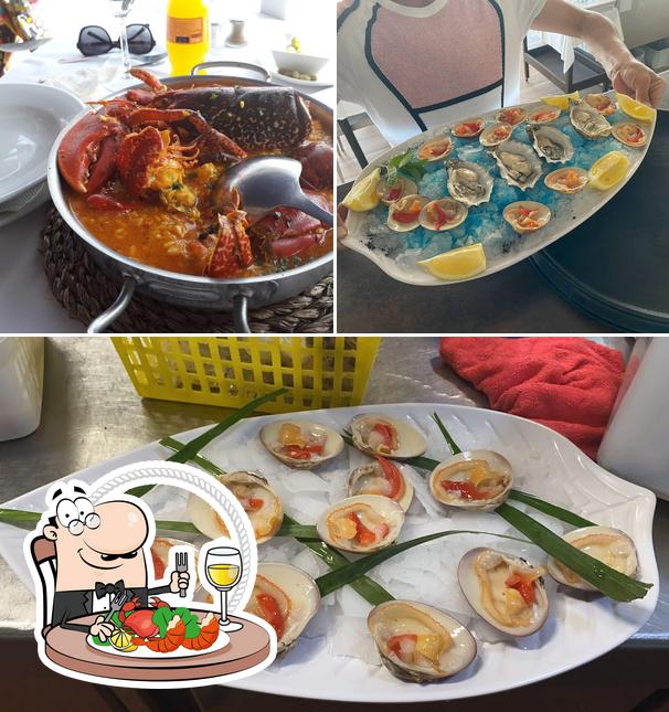 Попробуйте блюда с морепродуктами в "EL ANCLA RESTAURANTE"