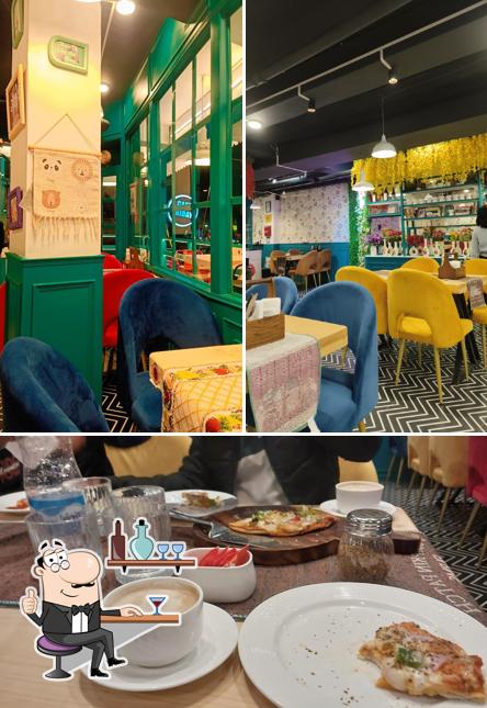 Among different things one can find interior and food at CAFE FRIDAY - Best Restaurant In Solan( Most Instagrammable Cafe ) 100% Vegetarian