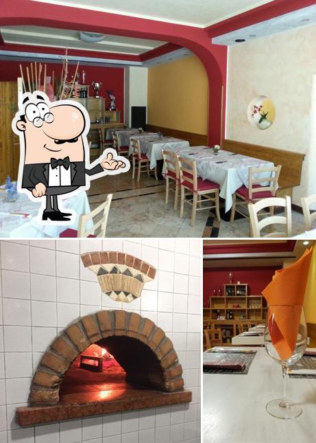 La foto della interni e tavolo da pranzo di Pizzeria da Valter