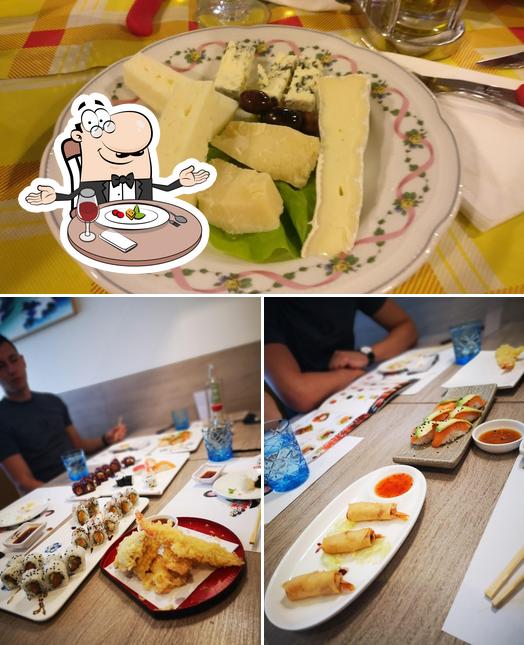 Dai un’occhiata alla foto che presenta la tavolo da pranzo e cibo di YUXI