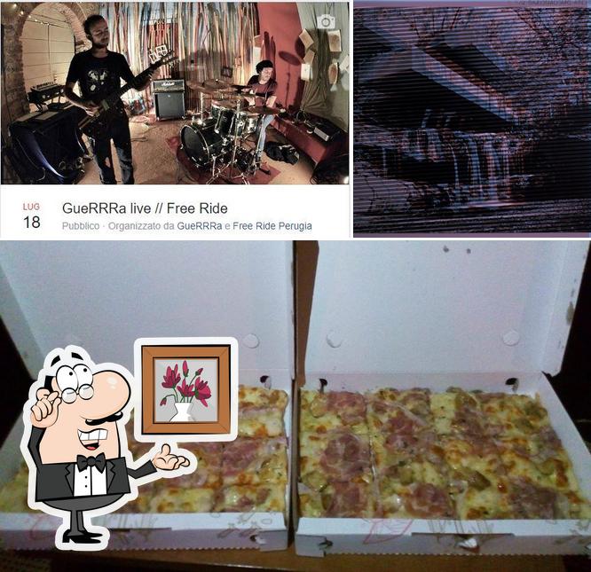 Guarda la foto che mostra la interni e pizza di Free Ride Bar