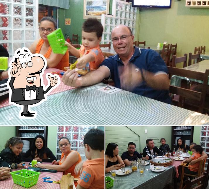 O interior do Família Santos Pizzaria