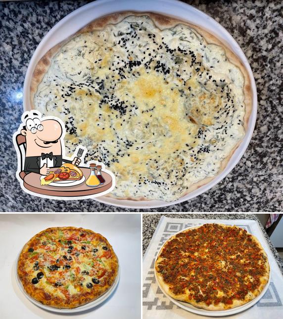 Essayez des pizzas à Humam food