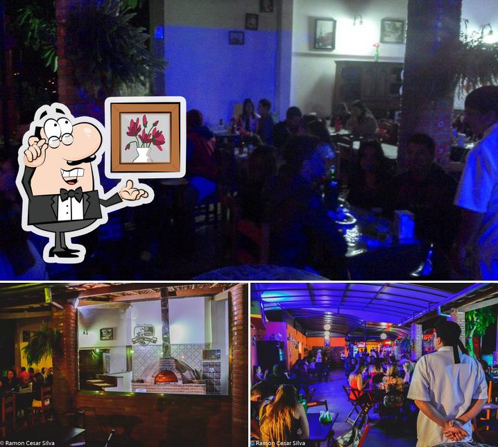 Sente em uma das mesas no Bar Consulado Das Gerais