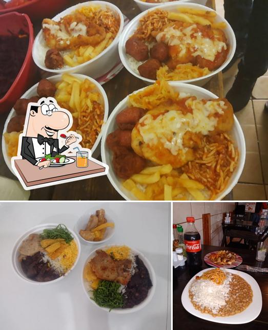 Entre diversos coisas, comida e bebida podem ser encontrados no Restaurante Bom Apetite