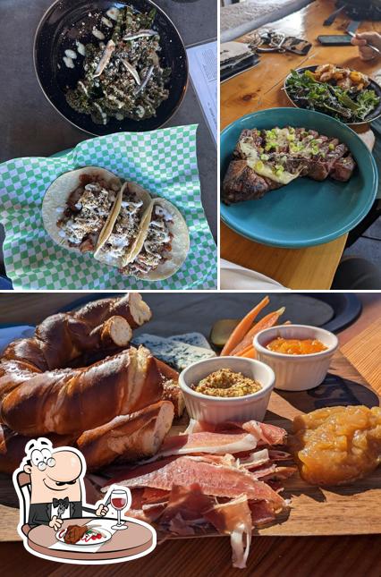 Get meat dishes at Dark Sky Brewing- Beer Garden + Atmosphere Kitchen