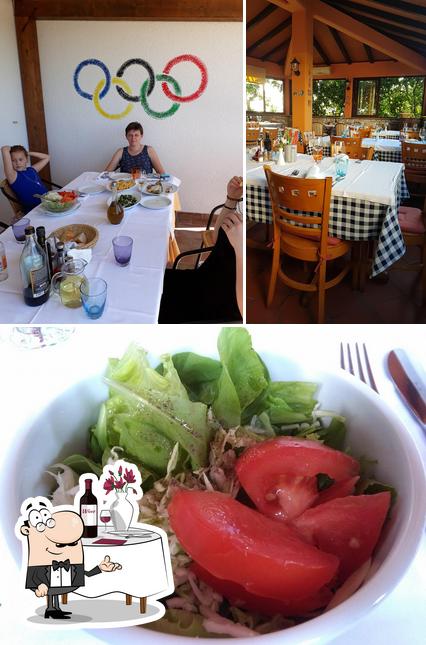 Guarda la immagine che presenta la tavolo da pranzo e cibo di Ristorante Giovanni