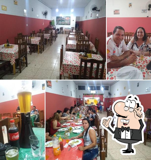 O interior do Bella Casa Pizzaria e Lanchonete