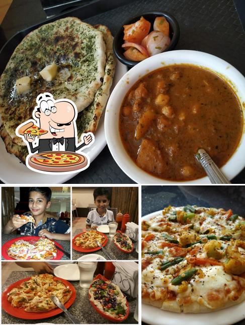 Order pizza at Figos Kitchen Goraya