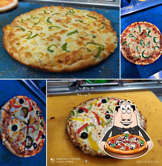 Try out pizza at S K Food Plaza