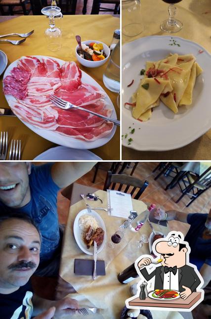 Questa è la immagine che raffigura la cibo e tavolo da pranzo di Osteria Il Cavatappi