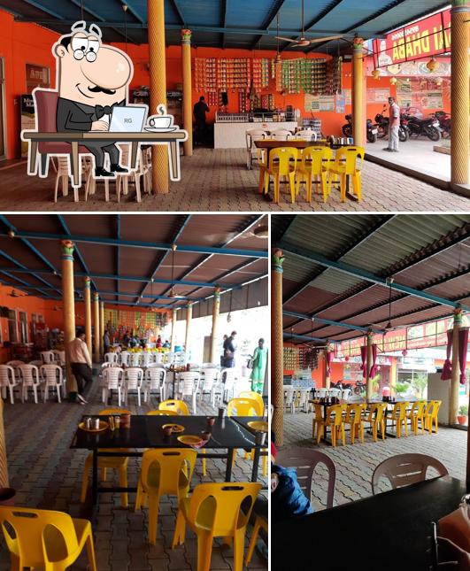 The interior of New Shri Sai Dhaba Pure Vegetarian Restaurant