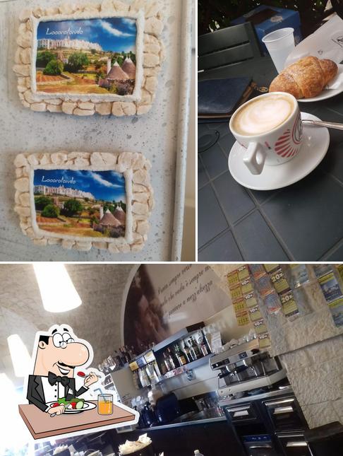 Questa è la immagine che presenta la cibo e interni di Domè Cafè