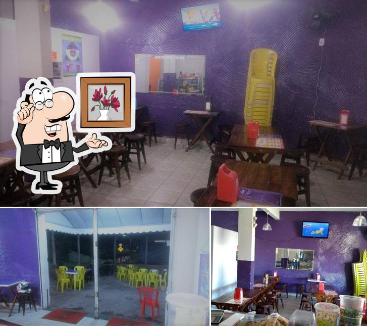 A ilustração do Frangão Lanches’s interior e mesa de jantar