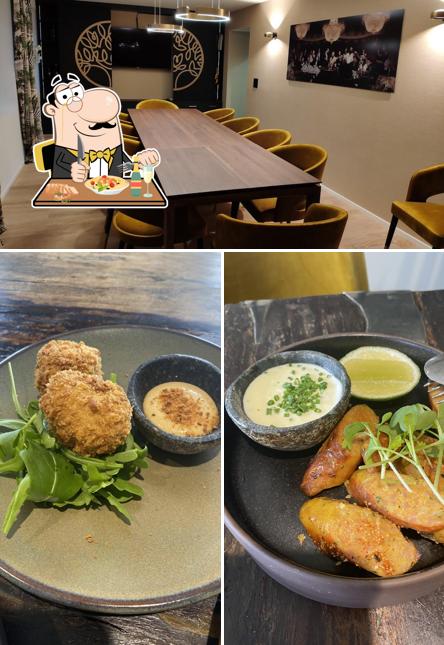 Questa è la foto che mostra la cibo e interni di ITAKI Restaurant