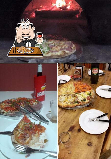 Escolha pizza no Pizzaria Mondini