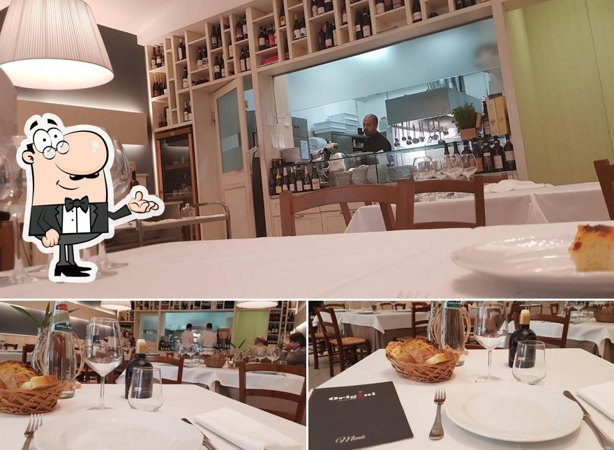 Dai un'occhiata agli interni di Origini vino & cucina