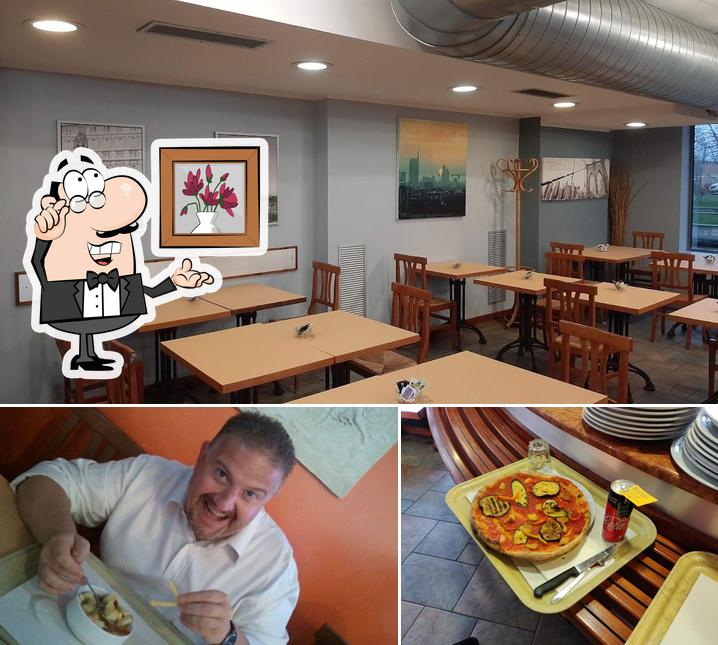 La immagine di interni e pizza da Ristorando, ristorante a Buffet e Pizzeria