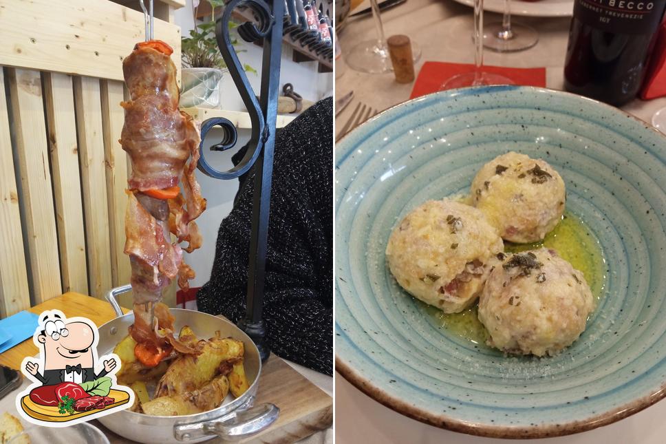 Try out meat dishes at Osteria Del Tiziano