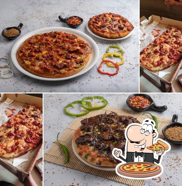 Get pizza at Pizza Caprina marol
