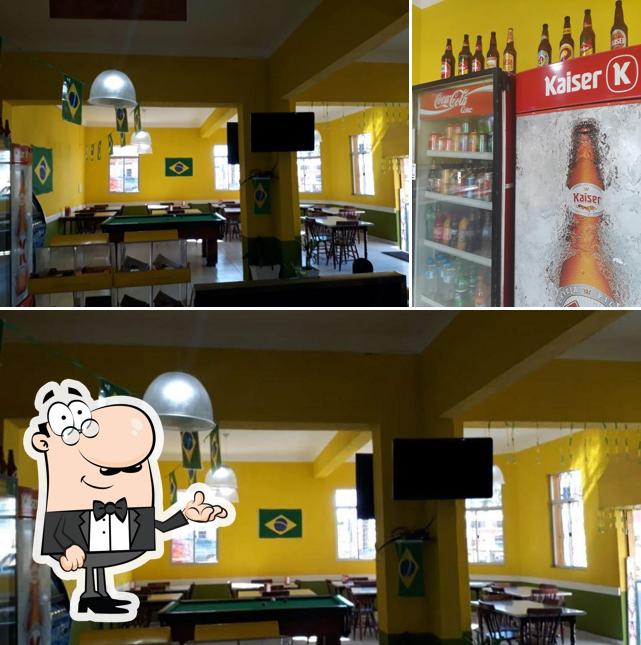 Esta é a imagem mostrando interior e cerveja no Bar Brasil (bar e restaurante)