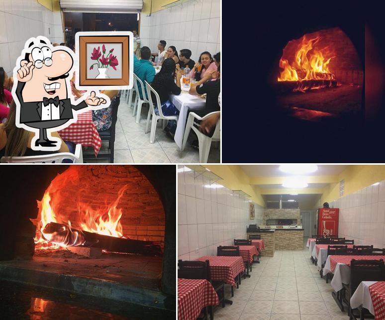 O interior do Pizzaria Rosa de Saron