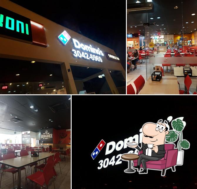 Sente em uma das mesas no Domino's Pizza - Campo Grande