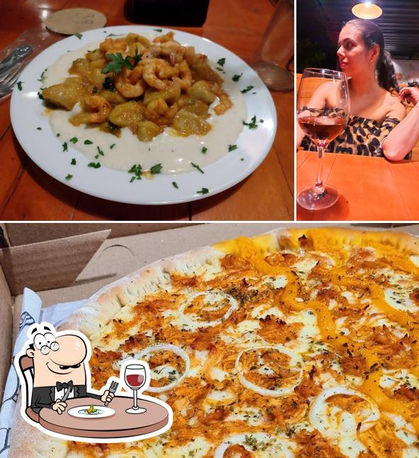 Entre diferentes coisas, comida e álcool podem ser encontrados no DOM PIZZARIA