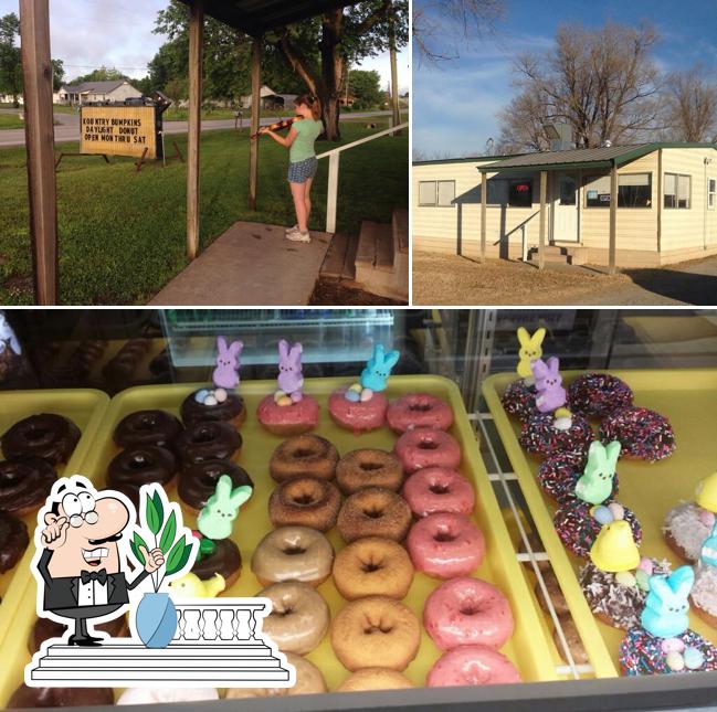 The photo of Kountry Bumpkins of Adair-Daylight Donuts’s exterior and dessert
