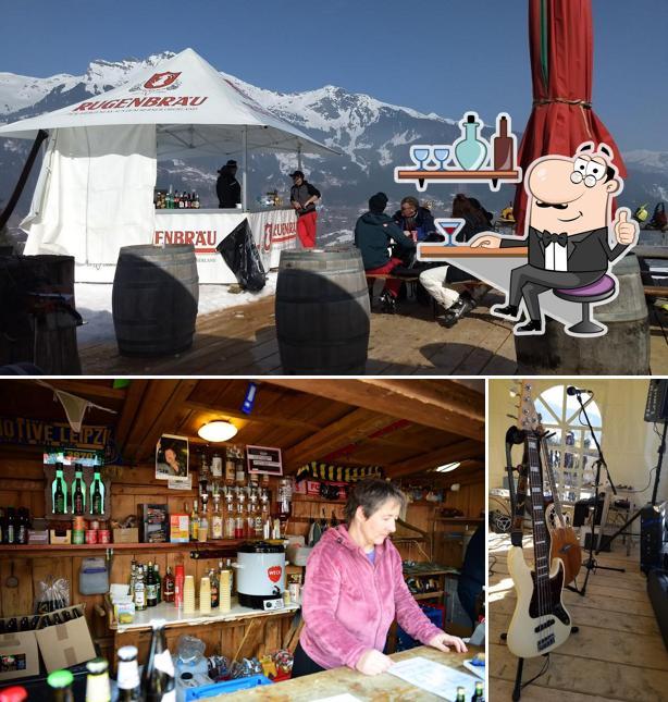 Dai un’occhiata alla immagine che presenta la interni e bancone da bar di Holzerbar