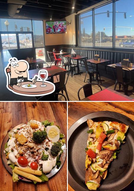 The photo of food and interior at Round Table Pizza