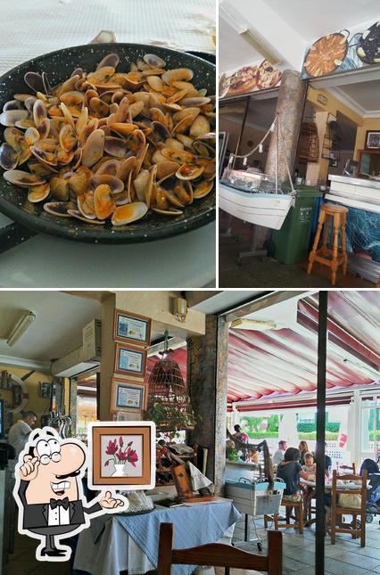 The photo of Restaurante El Pescador’s interior and seafood
