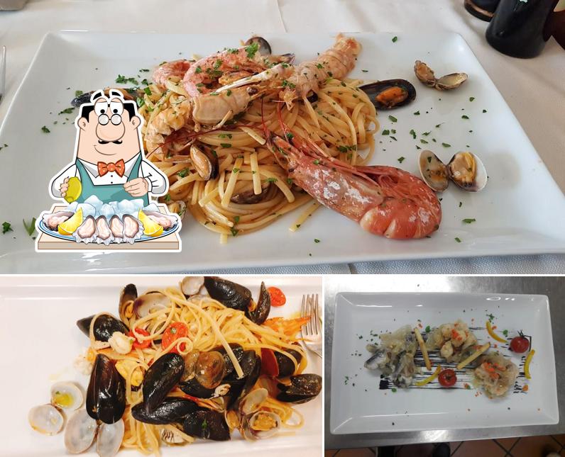 Assaggia i sapori della cucina di mare a Ristorante Darsena di Alberti Christian