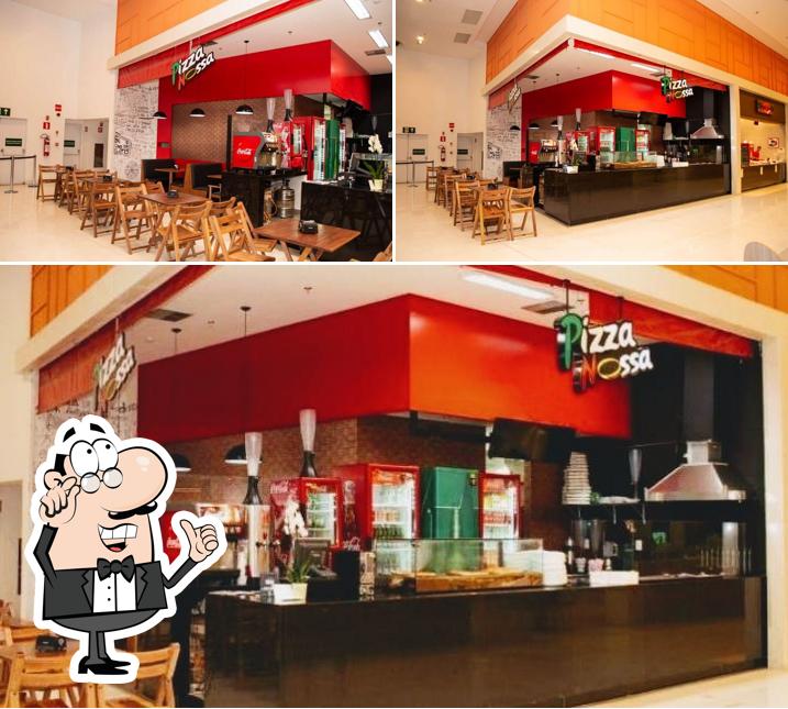 O interior do Pizza Nossa