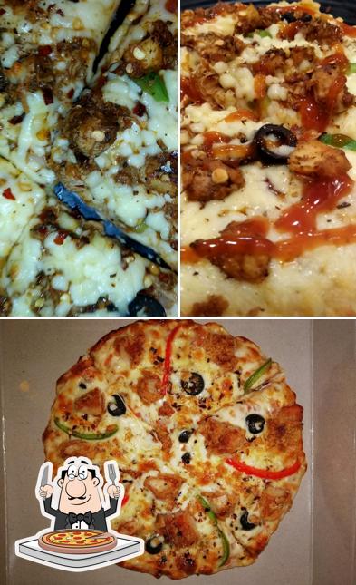 Try out pizza at SALT AND PEPPER FOOD HUB