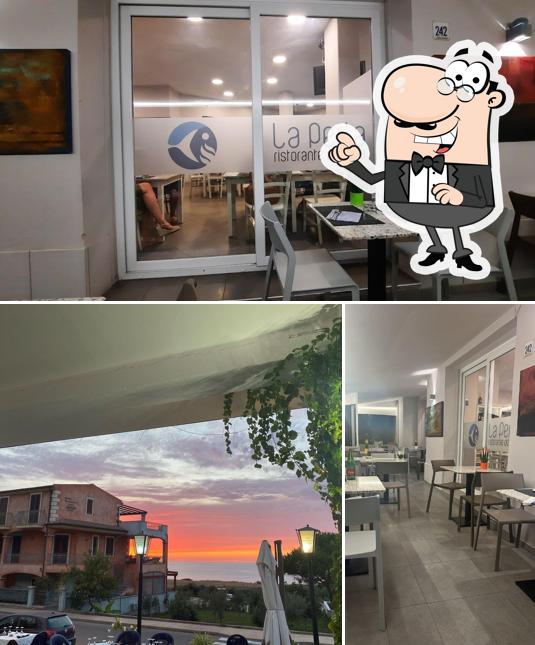 Tra le varie cose da La Perla ristorante pizzeria si possono trovare la interni e esterno
