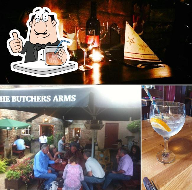 Check out the image displaying drink and interior at Butchers Arms