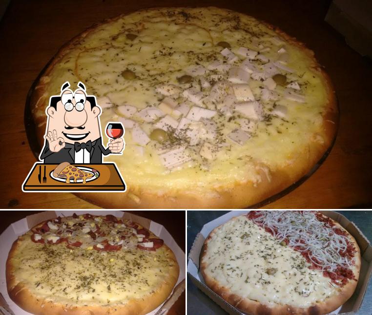 Escolha pizza no Pizzaria Malagueta