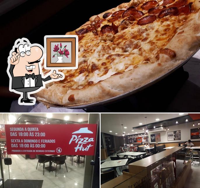 A ilustração da interior e pizza no Pizza Hut