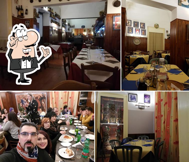 Dai un'occhiata agli interni di L'Oleandro Trattoria Pizzeria