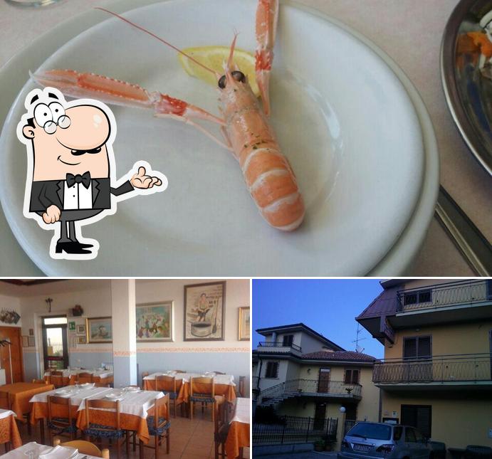 La immagine di interni e frutti di mare da Trattoria Maria la Priora