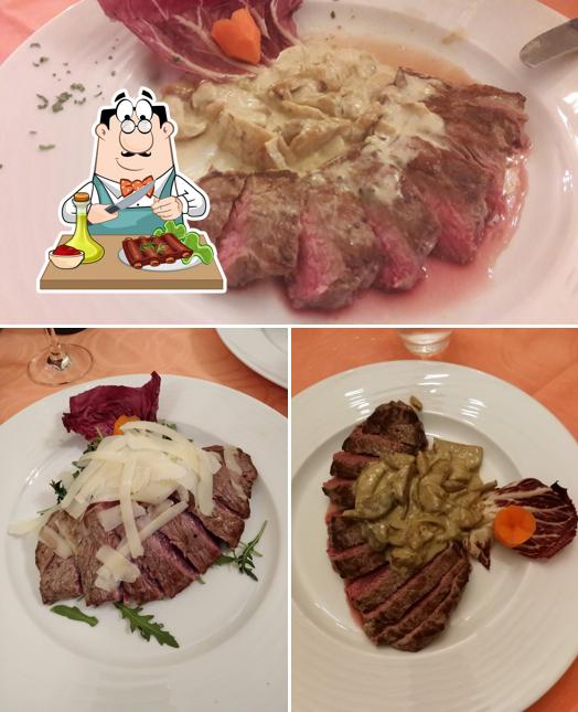 Piatti di carne vengono serviti a Trattoria Valtellinese