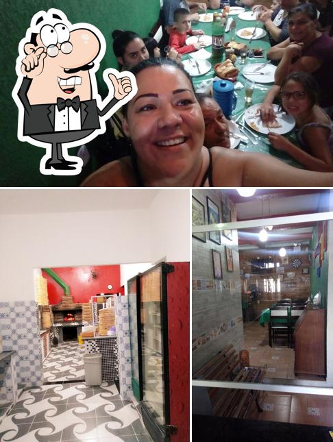 Veja imagens do interior do Pizzaria entre amigos