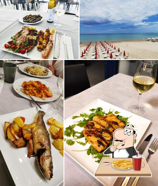 Ordina le patatine fritte a Beluga Beach Restaurant