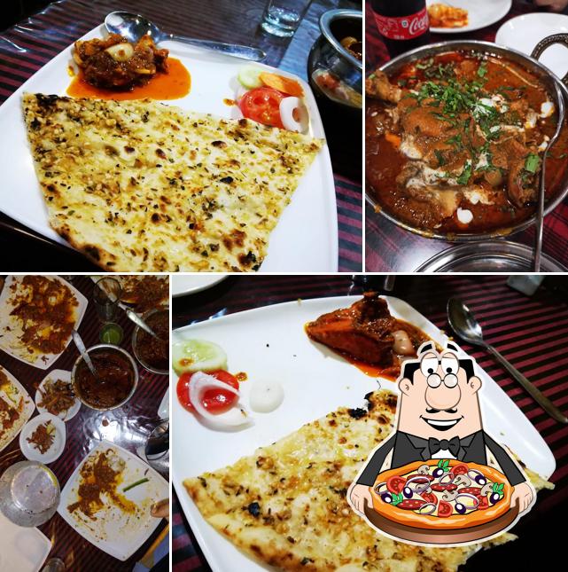 Pick pizza at Al-Kareem Restaurant
