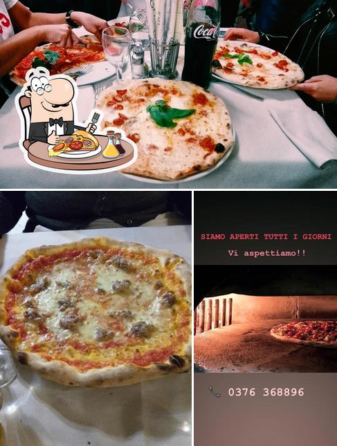 Prova una pizza a Ristorante Pizzeria al Quadrato e Residence Cà Mazzini