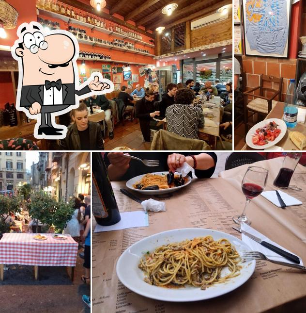 Siediti a un tavolo di Trattoria Al Ferro di Cavallo