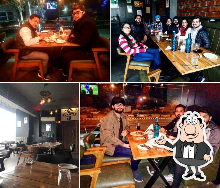 Take a seat at one of the tables at FSociety