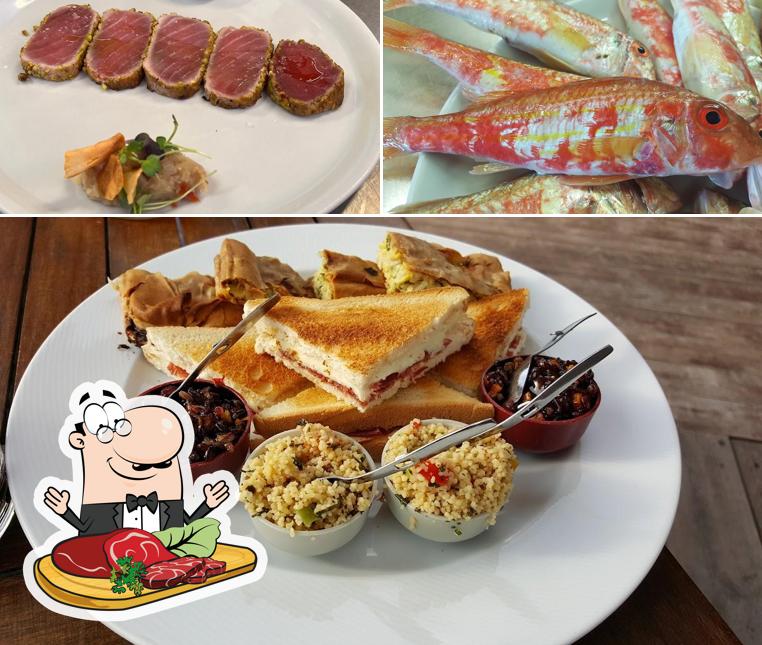 Prenditi i un pasto a base di carne a Amarea Ristorante Romolo Mare