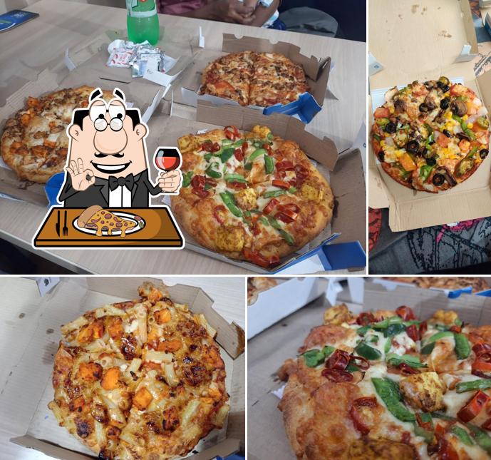Try out pizza at Domino's Pizza Mullakkal, Alappuzha